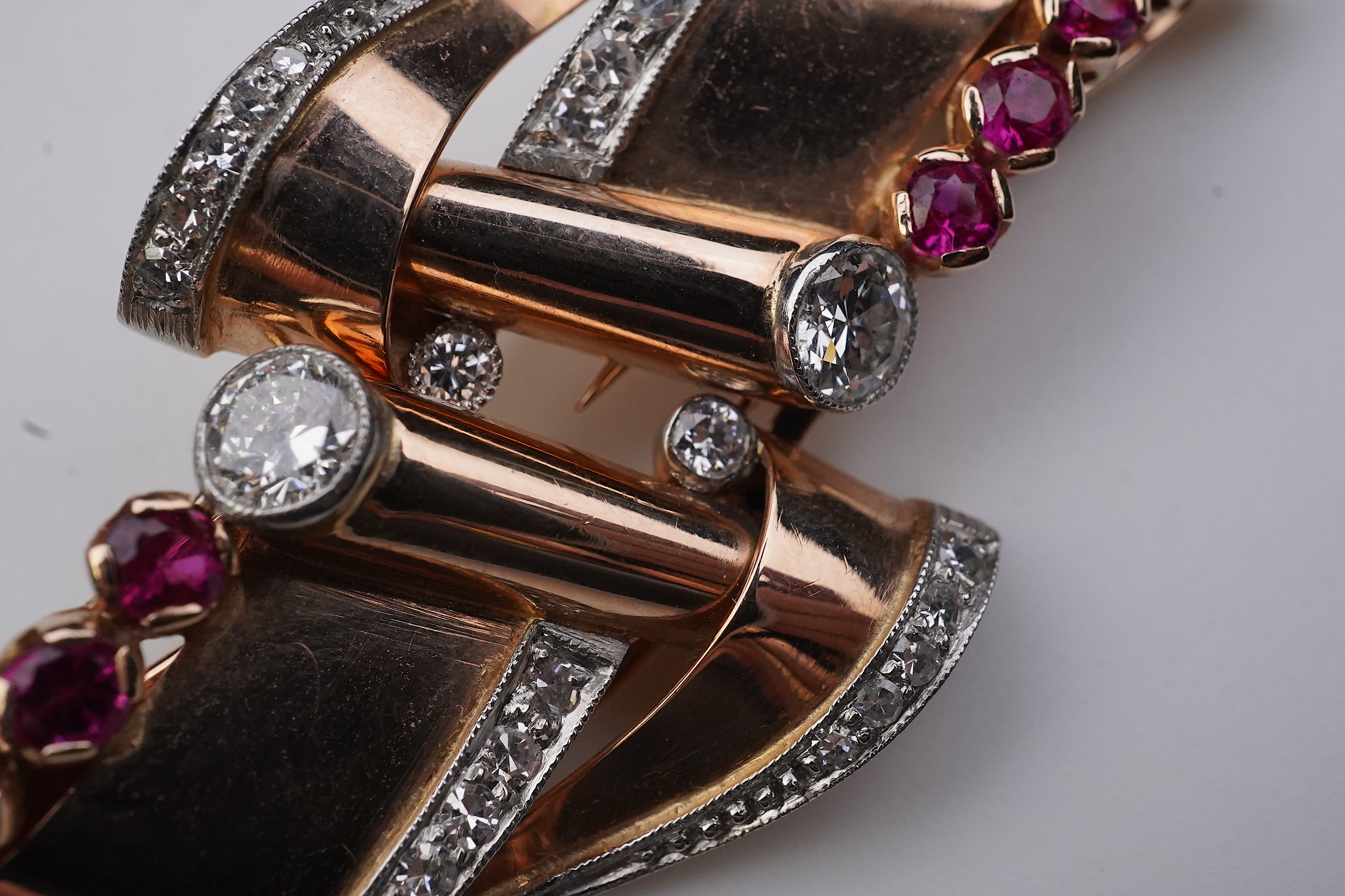 A Retro gold, synthetic ruby and diamond double clip brooch, circa 1940